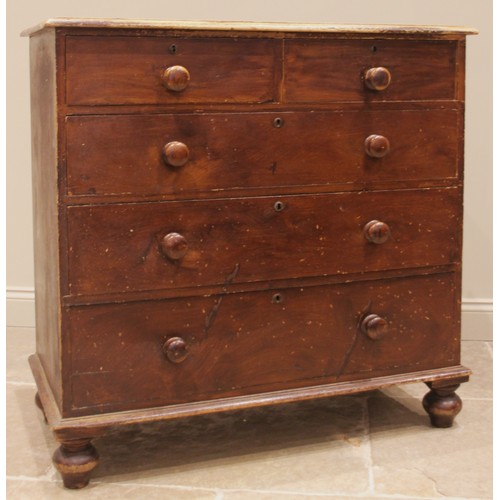 979 - A Victorian stained pine chest of drawers, the moulded top over an arrangement of two short and thre... 