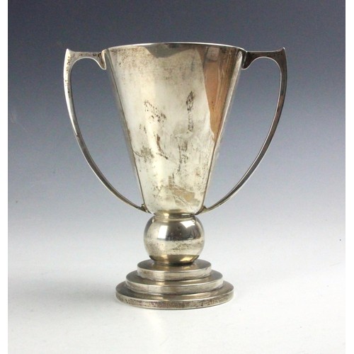 1 - A George V silver twin handled trophy, A L Davenport Ltd, Birmingham 1938, the stylised handles abov... 