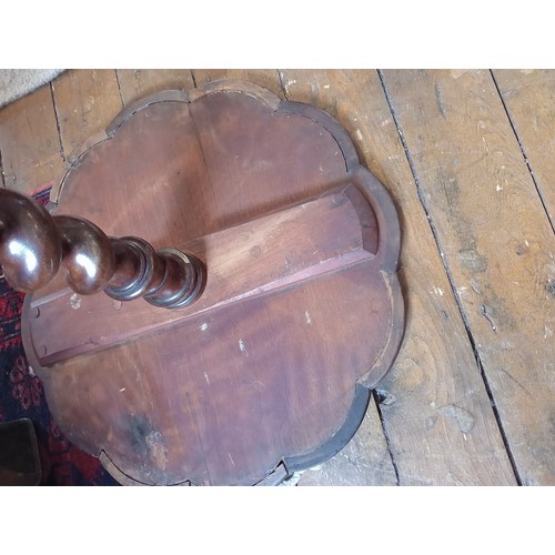 1005 - A William IV rosewood pedestal lamp or occasional table, the circular top with a raised and moulded ... 