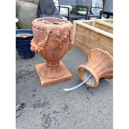 1079 - A pair of composite fibreglass simulated terracotta garden water features, modelled as garden urns w... 