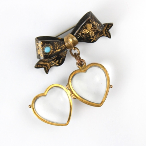 110 - A late 19th century style 'pool of light' heart locket/brooch, the heart shaped colourless paste loc... 