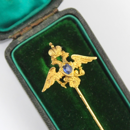 113 - An early 20th century Russian untested sapphire set stick pin, possibly by Faberge, the central oval... 