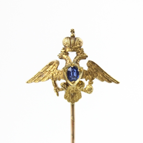 113 - An early 20th century Russian untested sapphire set stick pin, possibly by Faberge, the central oval... 