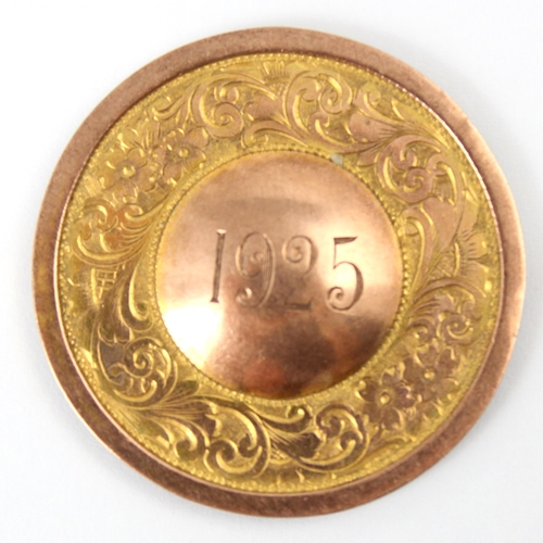 122 - An early 20th century 9ct rose gold medal, the circular medal engraved with floral border and centra... 