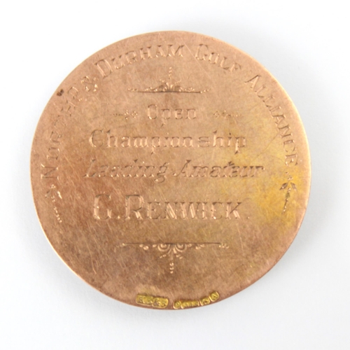 122 - An early 20th century 9ct rose gold medal, the circular medal engraved with floral border and centra... 