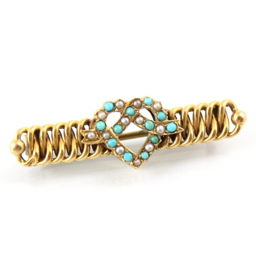 132 - A late 19th/early 20th century turquoise and pearl set brooch, the stylised heart shaped centre set ... 