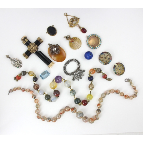 134 - A selection of costume jewellery, including a multi stone beaded necklace, the spherical beads inclu... 