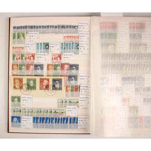 210 - A large quantity of mint and used stamps in dealer stock books, comprising: Germany 1872-1945 (four ... 