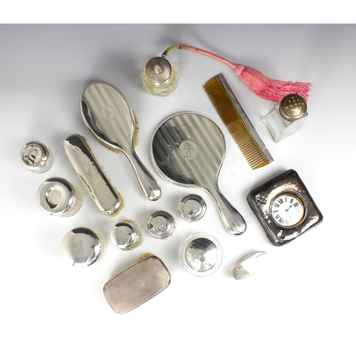 22 - A selection of 20th century silver mounted dressing table items, predominately hallmarked for Cheste... 