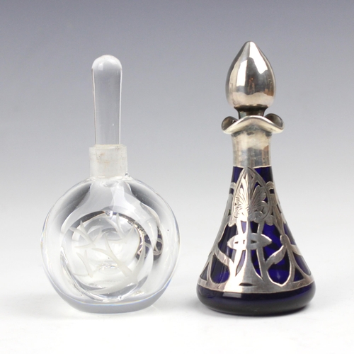 26 - An Edwardian silver and glass scent bottle, possibly Henry Herbert Friend, the tear drop shaped stop... 