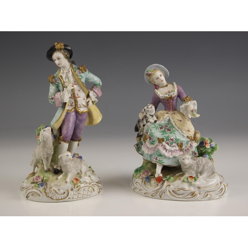 265 - A pair of Sitzendorf porcelain figures, 19th century, modelled as a shepherd, 18cm high, and a sheph... 