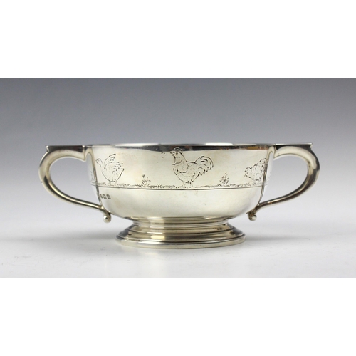 3 - A George V silver twin handle bowl, Adie Brothers Ltd, Birmingham 1932, the loop handles above engra... 