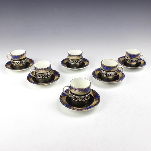 30 - A set of six George V silver mounted coffee cans and saucers, William Davenport, Birmingham possibly... 