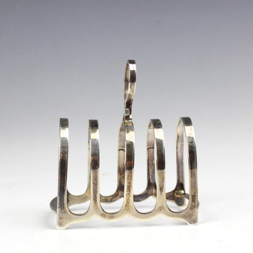 35 - A cased set of four George VI silver toast racks, Cooper Brothers & Sons Ltd, Sheffield 1940, retail... 