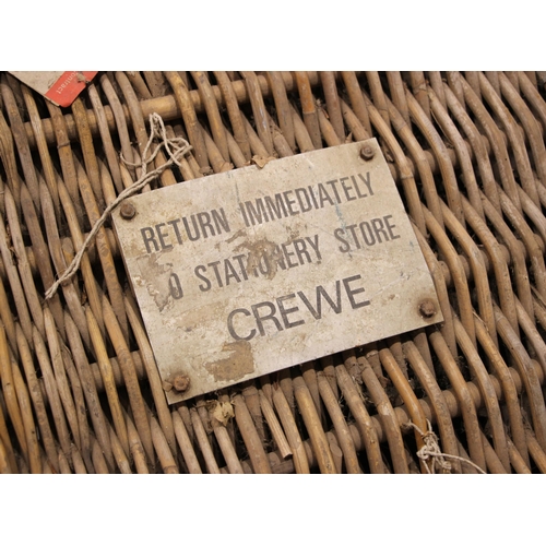 368 - Two wicker railway baskets, early to mid 20th century, each stencil sprayed for Crewe, with rope han... 