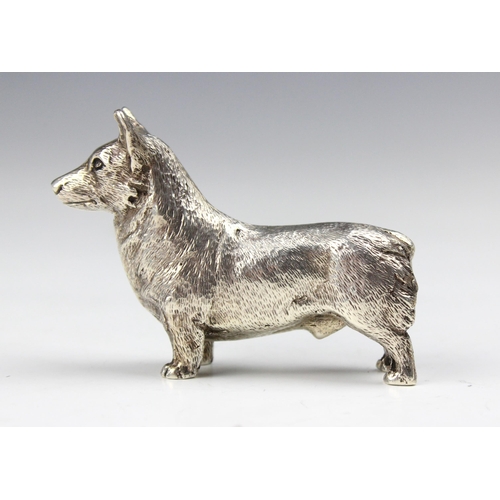 40 - A silver model of a Corgi, Edward Barnard and Sons Ltd, London 1975, the dog modelled standing with ... 