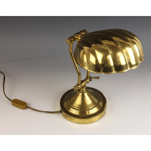 405 - An Art Deco lacquered brass desk lamp, early 20th century, the shade modelled as a half shell, 17cm ... 