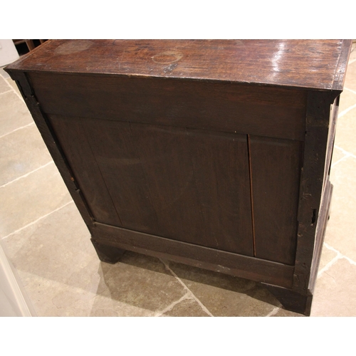 428 - A Jacobean geometric moulded oak chest of drawers, 17th century and later, formed with four long dra... 