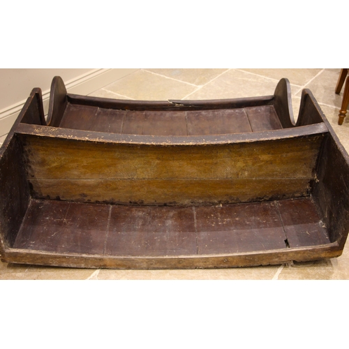 451 - A stained wood barrel back tavern settle, probably elm, late 18th/early 19th century, the curved ton... 