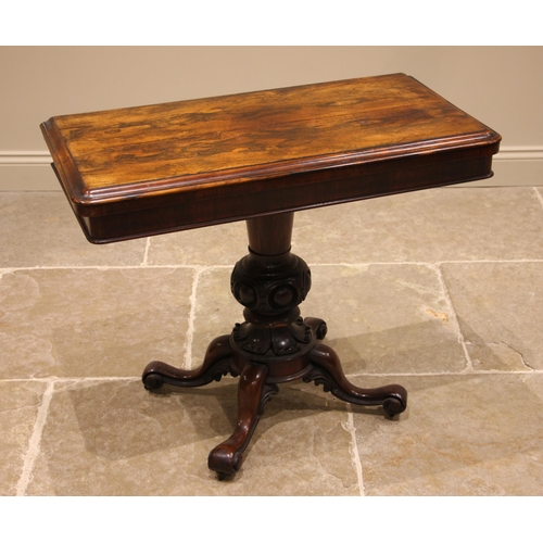 464 - A William IV rosewood card table, the rounded and moulded hinged rectangular top opening to a circul... 