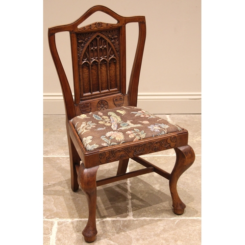 473 - A late 19th century oak and fruitwood ecclesiastical side chair, the oak back rest applied with an a... 