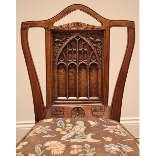 473 - A late 19th century oak and fruitwood ecclesiastical side chair, the oak back rest applied with an a... 