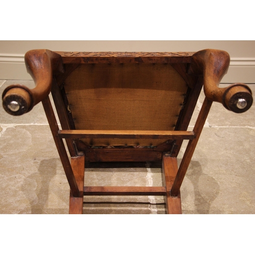 473 - A late 19th century oak and fruitwood ecclesiastical side chair, the oak back rest applied with an a... 