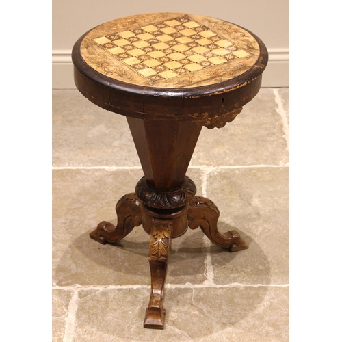 481 - A Victorian inlaid walnut games/work table, the circular swivel top inlaid with a checkerboard openi... 