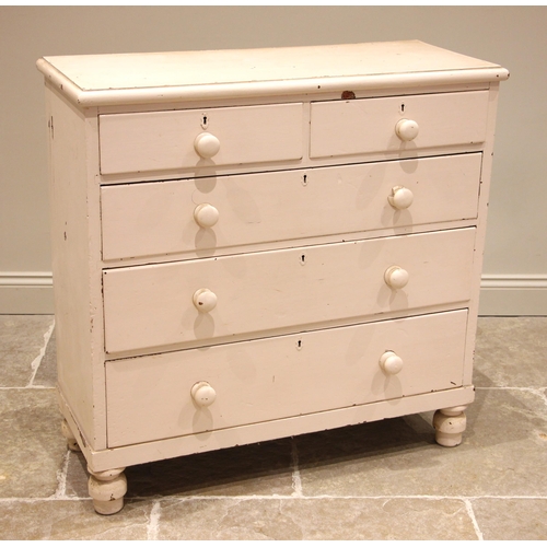 483 - A Victorian white painted pine chest of drawers, the moulded rectangular top over an arrangement of ... 