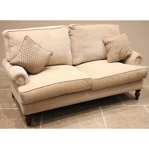 511 - A Nova bespoke 'George' two seater sofa, early 21st century, upholstered in oatmeal coloured fabric,... 