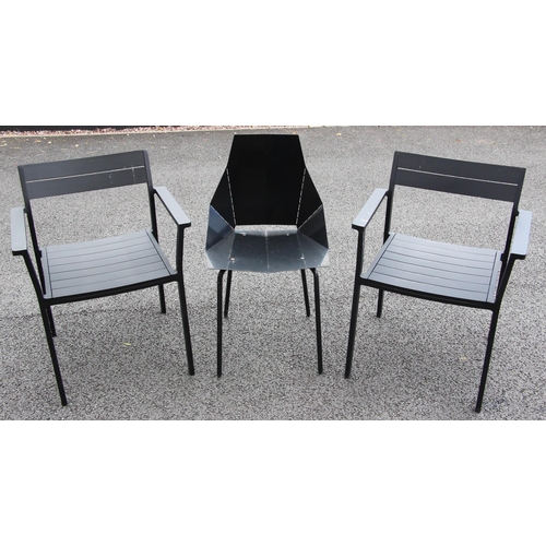 520 - A pair of powder coated metal garden/patio chairs by Case, finished in black, 77cm high, along with ... 