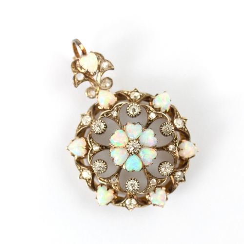 67 - A late 19th century diamond and opal pendant (converting to a bangle) the central six heart shaped o... 