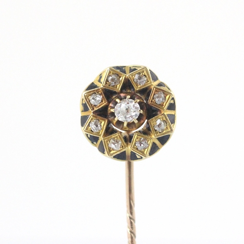 83 - A 19th century style diamond and enamel stick pin, the circular head set with central old cut diamon... 