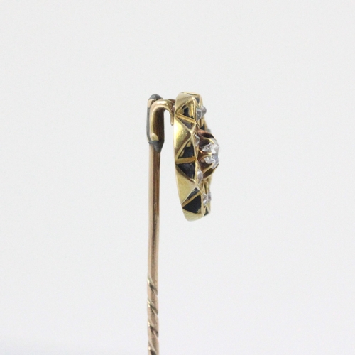 83 - A 19th century style diamond and enamel stick pin, the circular head set with central old cut diamon... 