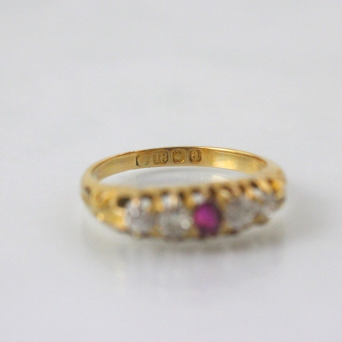 86 - A Victorian 18ct yellow gold Burmese ruby and diamond ring, the central cushion cut ruby with two ol... 