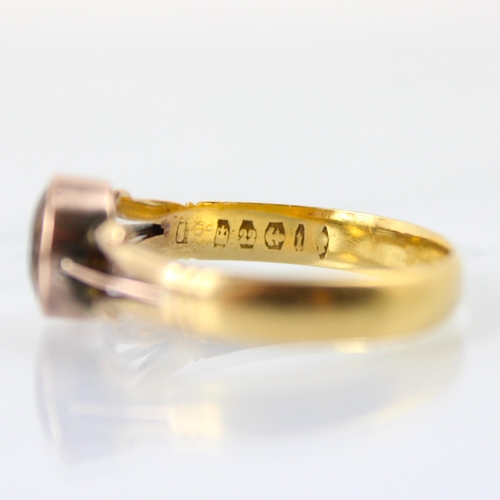 92 - A 22ct yellow gold wedding band, converted to a citrine set dress ring, the circular cut citrine wit... 