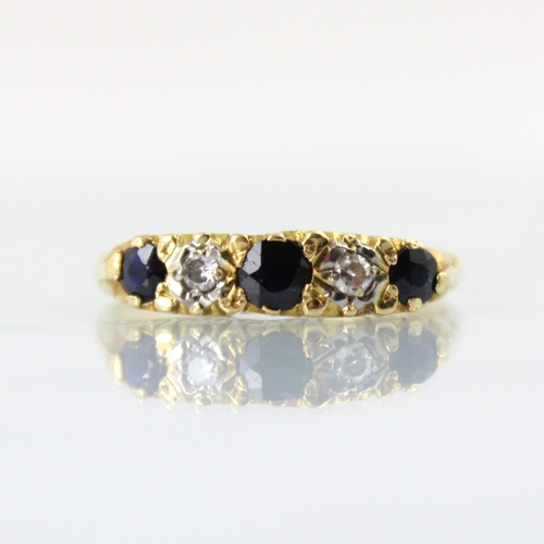 95 - A Victorian style untested sapphire and diamond five stone ring, the three graduated round cut untes... 