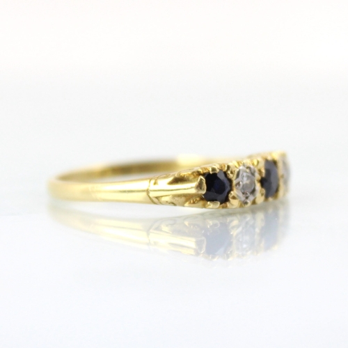 95 - A Victorian style untested sapphire and diamond five stone ring, the three graduated round cut untes... 