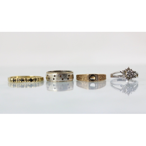 99 - A selection of four rings, including a 9ct white gold diamond cluster ring, ring size H, a 9ct yello... 