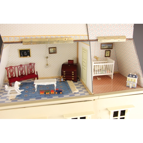 363 - A dolls house, late 20th century, modelled as a three storey French style country house, the frontag... 