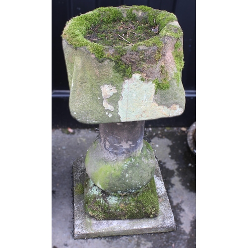 522 - A 19th century sandstone bird bath, the octagonal shaped bath with a shallow well upon a gourd form ... 