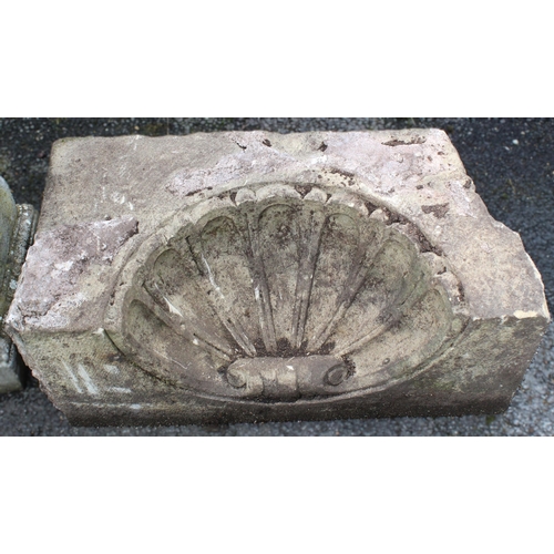 526 - A sandstone alcove or water feature pediment, carved as an inverted shell, 36cm H x 75cm W x 32cm D,... 