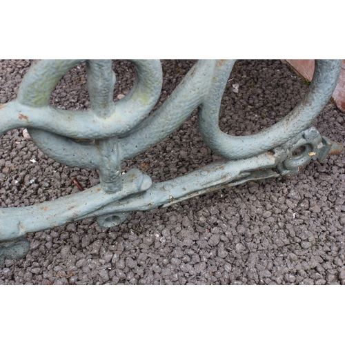 528 - A Victorian Coalbrookdale style cast iron serpent and grape pattern garden bench, the painted cast s... 