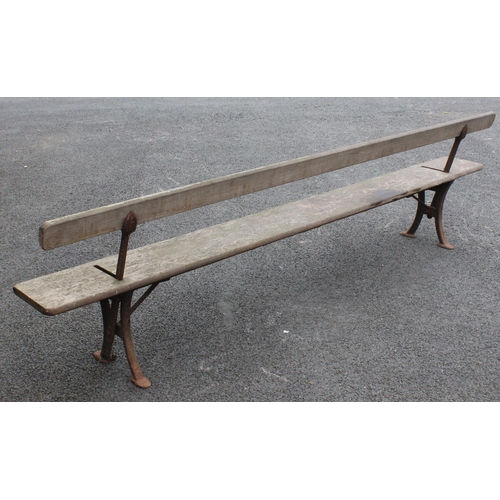 529 - A late 19th/early 20th century railway platform bench by Addison & Co, Wellington, the swing-over ba... 