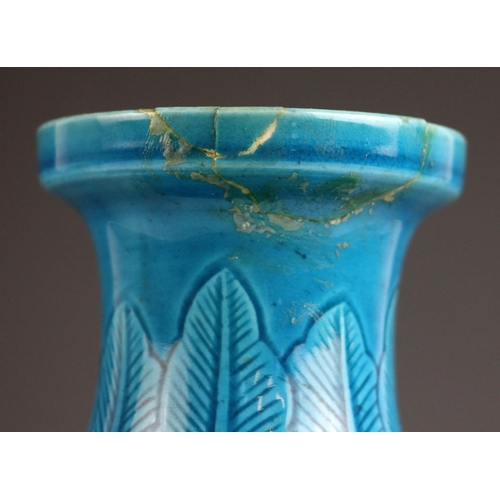 305 - A Chinese turquoise glazed Sgraffito vase, late 19th century, of baluster form with incised lotus le... 