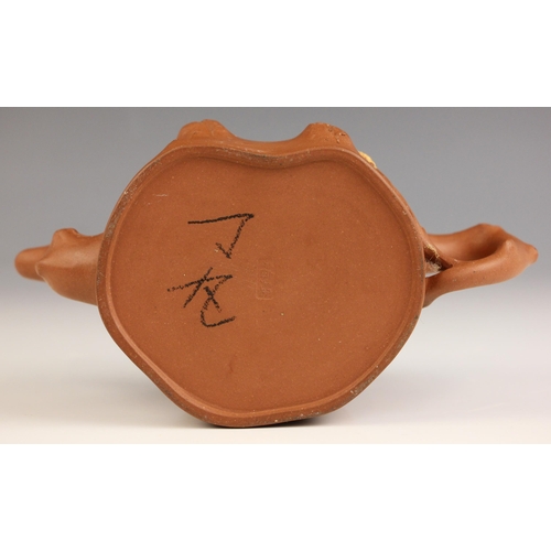 308 - A Chinese Yixing teapot and cover, 20th century, of kidney shape with naturalistic handle and spout,... 