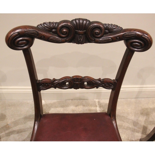 435 - A set of seven George IV rosewood dining chairs, each with a carved scrolled crest rail over a confo... 