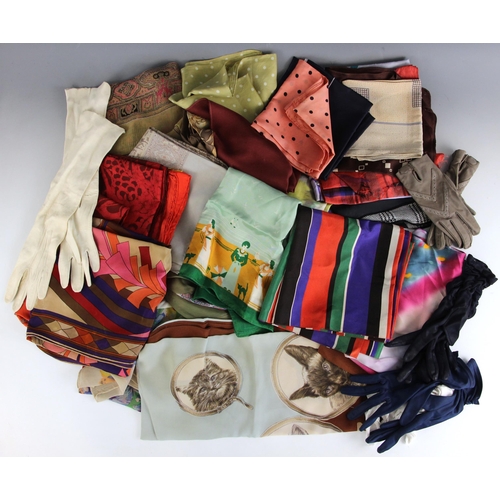 377 - A collection of ladies pure silk scarves, predominantly mid-late 20th century, in a variety of polyc... 