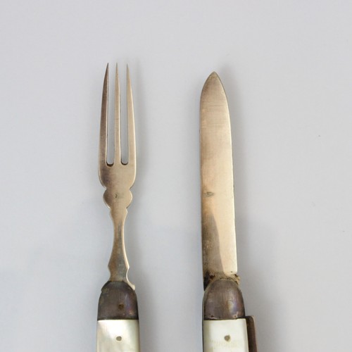 36 - A set of George V silver and 'mother of pearl' campaign cutlery, retailed by Finnigans, C W Fletcher... 