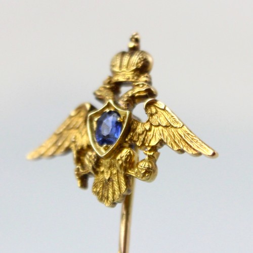 113 - An early 20th century Russian untested sapphire set stick pin, possibly by Faberge, the central oval... 